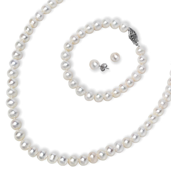photo of white pearl set, includes earrings, 7" bracelet and an 18" strand